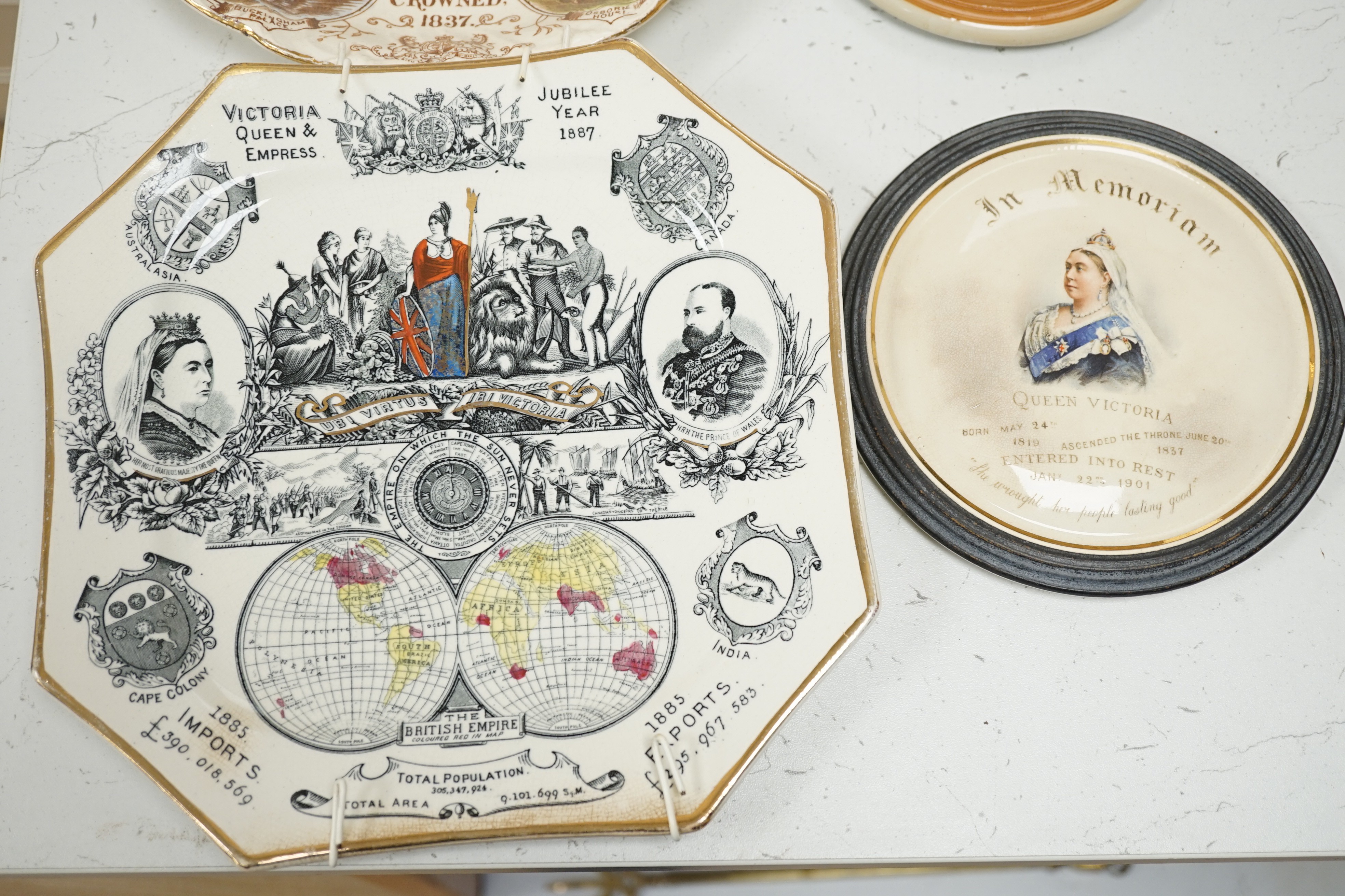 A Queen Victoria Balance of Payments plate, a memoriam plaque an 1897 Diamond Jubilee plate and a Diamond Jubilee procession chromolithograph